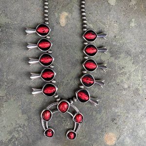 Red squash blossom necklace